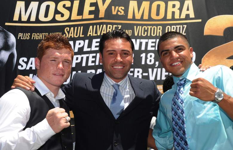 Canelo Álvarez (izq. a der.), Oscar de la Hoya y Victor Ortiz (Getty)