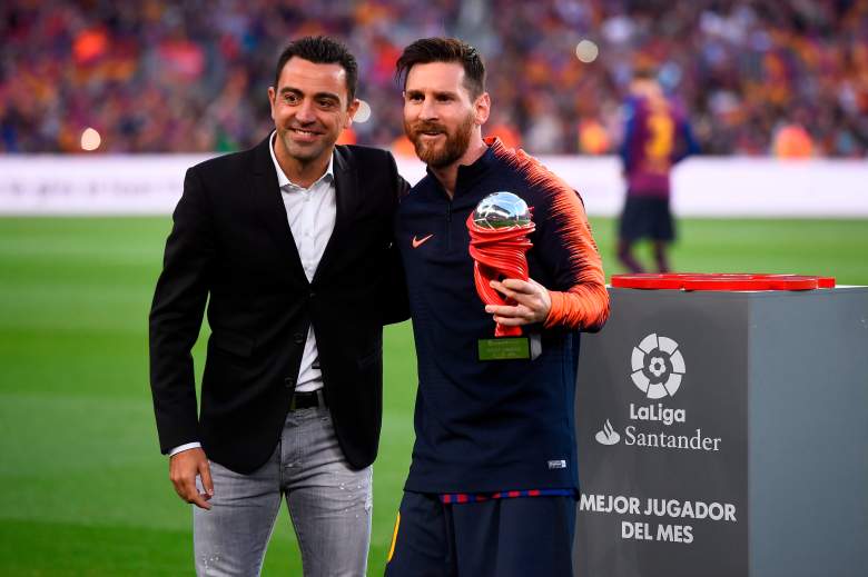 Xavi Hernandez y Lionel Messi